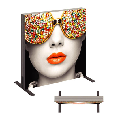 Backlit trade show display featuring a woman's face with embellished sunglasses and vibrant lips for exhibitions