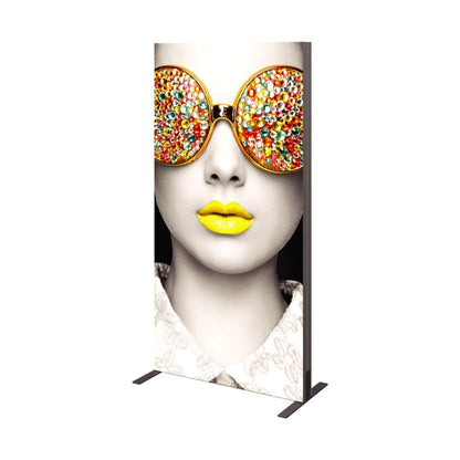 Vertical trade show fabric display featuring artistic face with colorful embellished sunglasses and bold lips