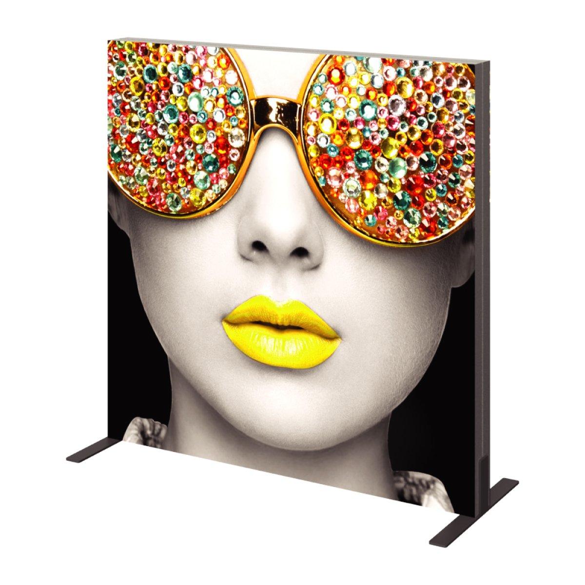 Large trade show display featuring close-up portrait with embellished sunglasses and yellow lips
