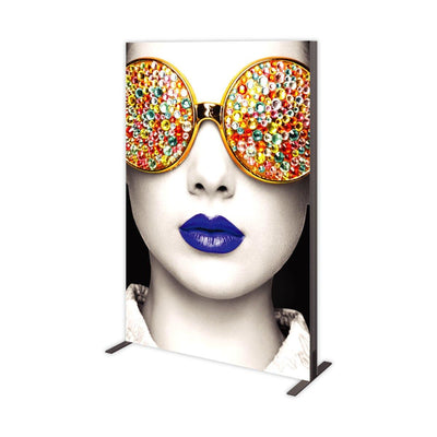 Large graphic display featuring a close-up portrait with decorative glasses and bold lips for trade show exhibits