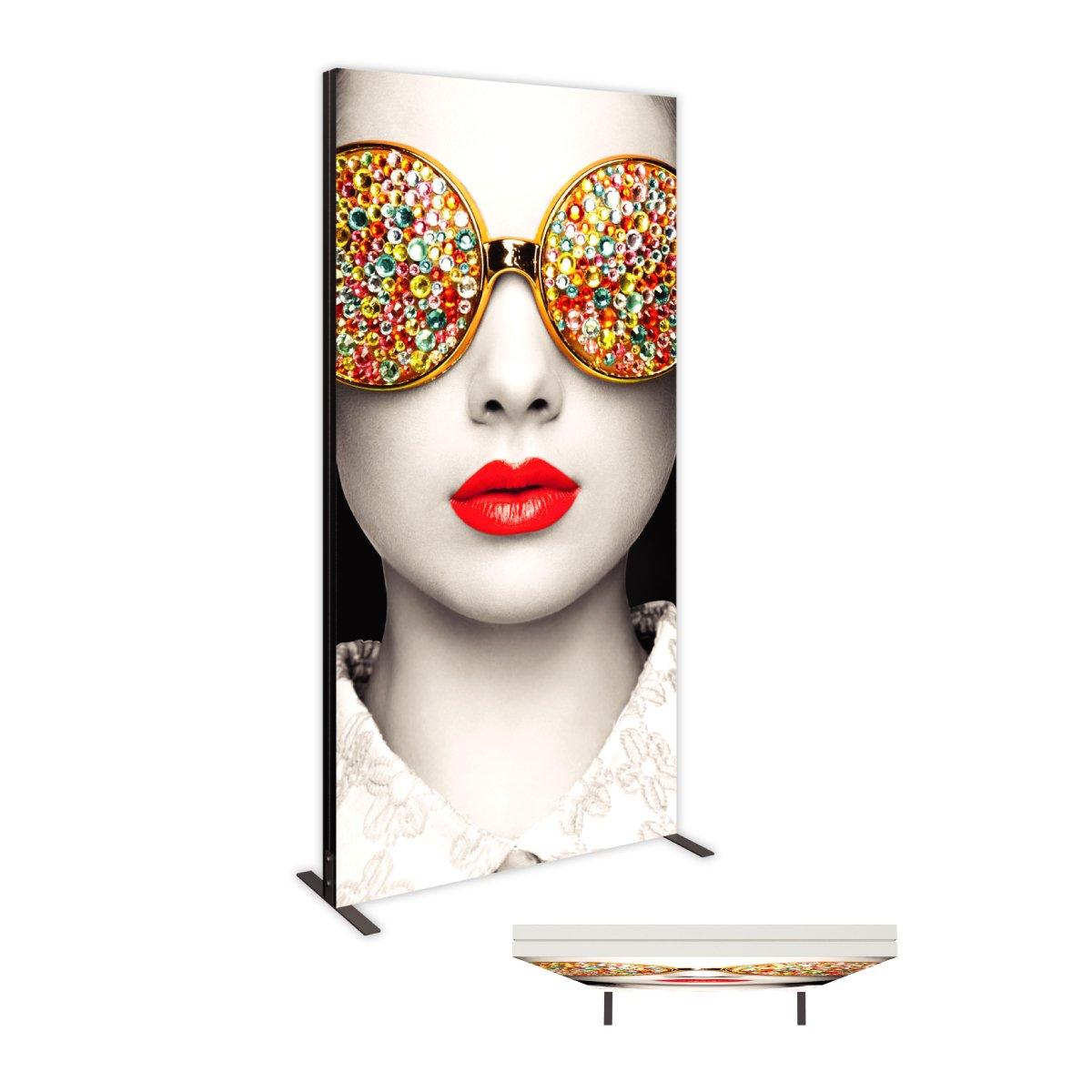 Large vertical lightbox display featuring artistic close-up of face with embellished sunglasses and bold lips for trade shows