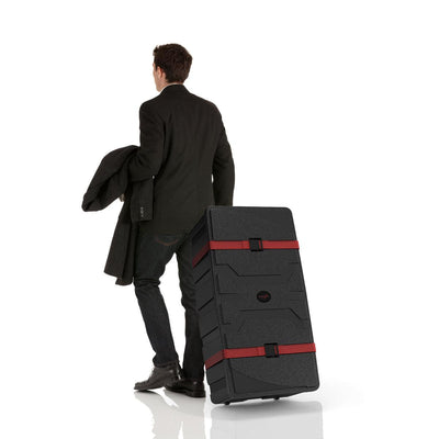 Person pulling rugged rolling case suitable for trade shows and special event transportation