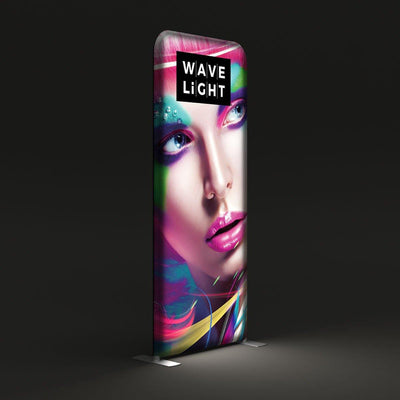 Tall LED backlit display with colorful artistic face graphic for trade shows and exhibitions