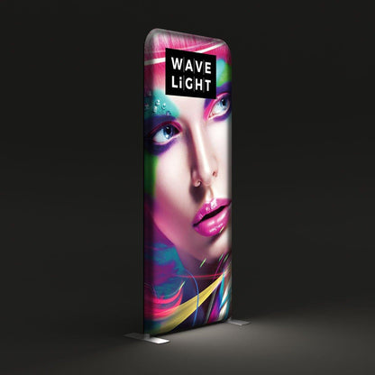 Tall LED backlit display with colorful artistic face graphic for trade shows and exhibitions