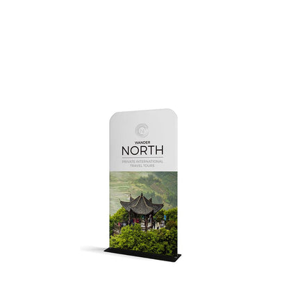 Portable trade show banner stand featuring travel tour advertisement with scenic landscape and pavilion