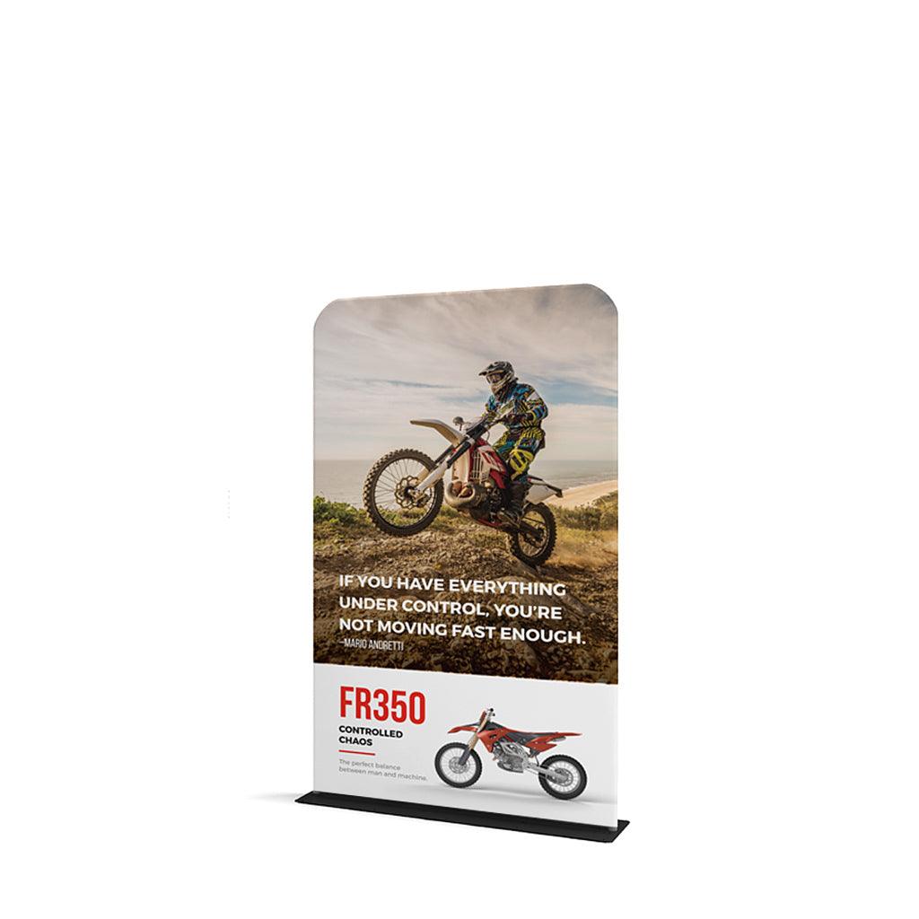 Portable trade show banner stand featuring motocross rider and bike for exhibitions and events