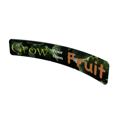 Curved trade show banner with text 'Grow Your Own Fruit' showcasing exhibition display graphics