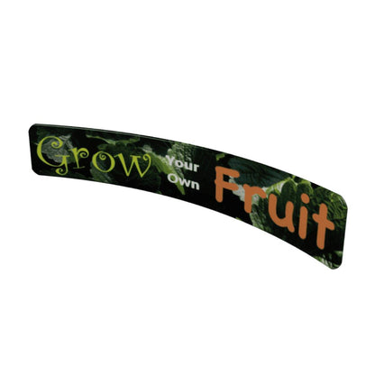 Curved trade show banner with text 'Grow Your Own Fruit' showcasing exhibition display graphics