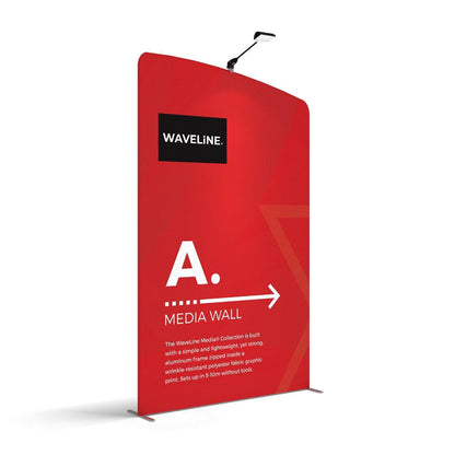 Portable WaveLine media wall display with fabric graphic and built-in lighting for trade shows and exhibitions
