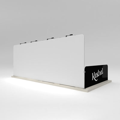 Modular trade show display wall with overhead lighting and branded end panel for exhibitions