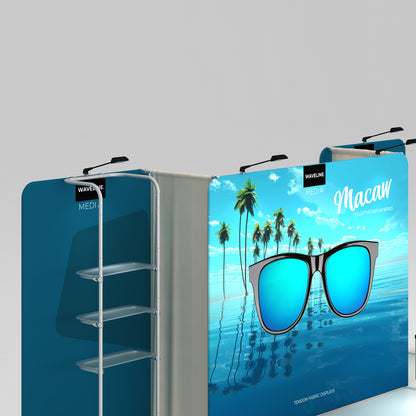 Trade show fabric display booth with vibrant tropical graphics and shelving units for exhibitions
