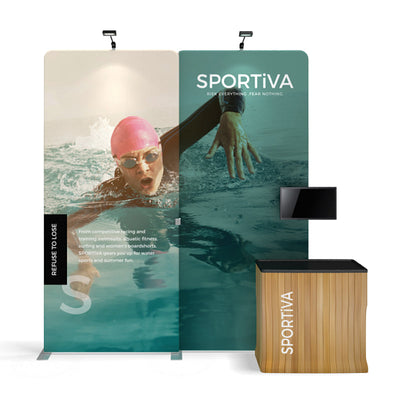 Trade show display featuring SPORTIVA branding with swimmer image, spotlight, monitor, and presentation counter