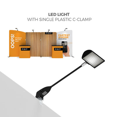 LED light with plastic C-clamp for illuminating trade show and exhibition booths