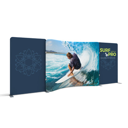 Curved trade show display with vibrant surfing image and promotional branding for exhibitions and events