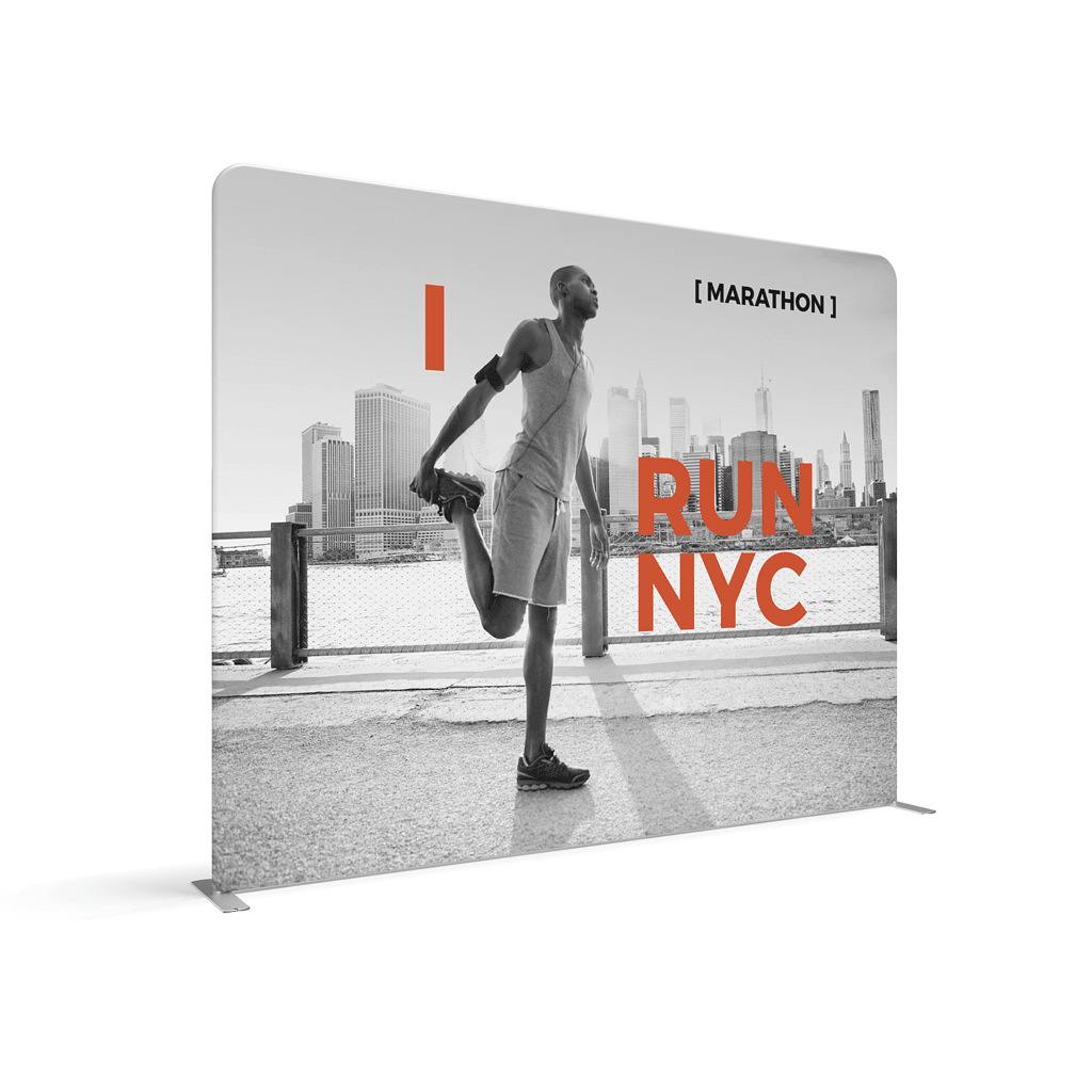 Trade show display featuring marathon runner stretching with NYC skyline backdrop for exhibitions and events