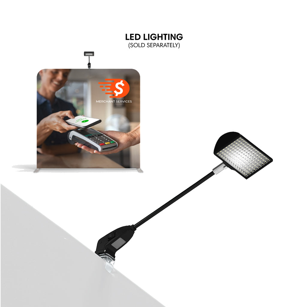 LED clip-on light attached to trade show tabletop display for enhanced exhibition booth visibility