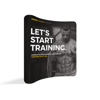 Curved trade show display featuring fitness training promotion with muscular man and motivational text