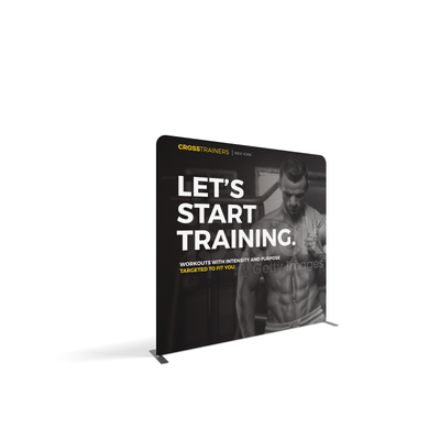 Trade show display panel featuring fitness training advertisement with muscular man and motivational text