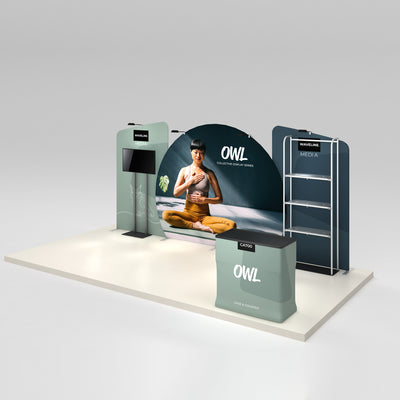 Trade show booth with large curved backdrop, media display, shelving, and counter for exhibitions