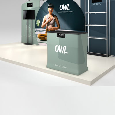 Trade show booth setup featuring OWL collective display series case and counter with media stand and backdrop for exhibitions