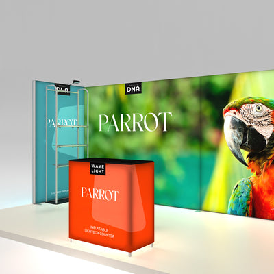 Trade show display with inflatable lightbox counter and large parrot graphic backdrop