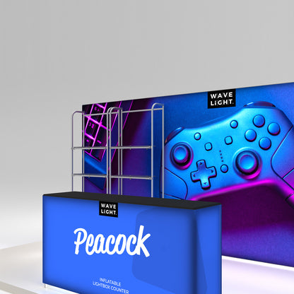 Inflatable lightbox counter with graphic trade show display featuring gaming controller and keyboard