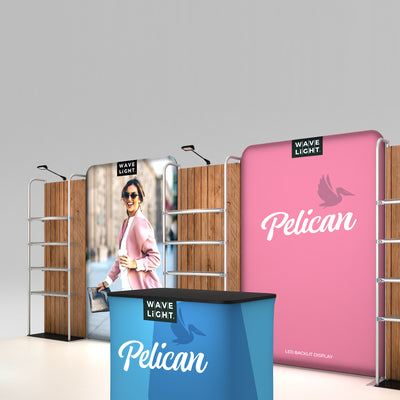 Trade show display setup with branded backlit fabric panels and promotional counter for exhibitions
