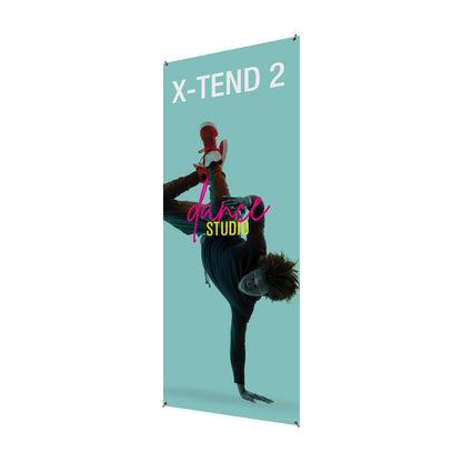 Tall banner stand displaying dance studio promotion with dynamic dancer image for trade shows
