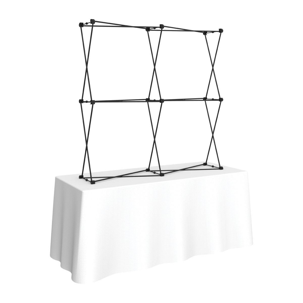 Foldable tabletop display frame set up on table for trade shows and exhibitions