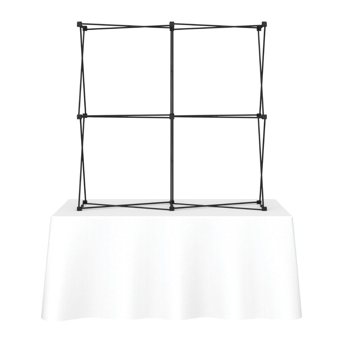 Portable tabletop display frame on table for trade shows and exhibitions