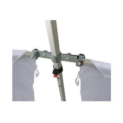 Close-up of metal frame joint and clamp securing fabric panels on trade show tent structure