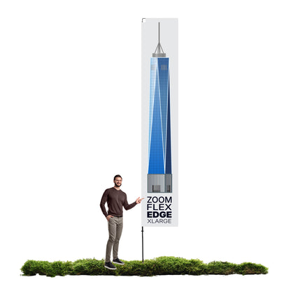 Man standing beside large vertical banner display featuring a tall building graphic for trade shows and exhibitions
